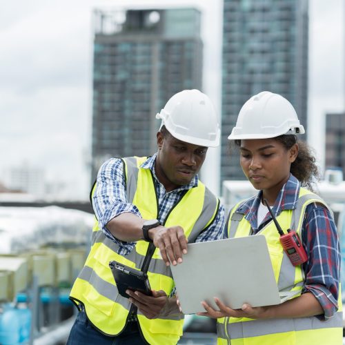 Group,Of,African,American,Engineer,Worker,Working,In,Sewer,Pipes